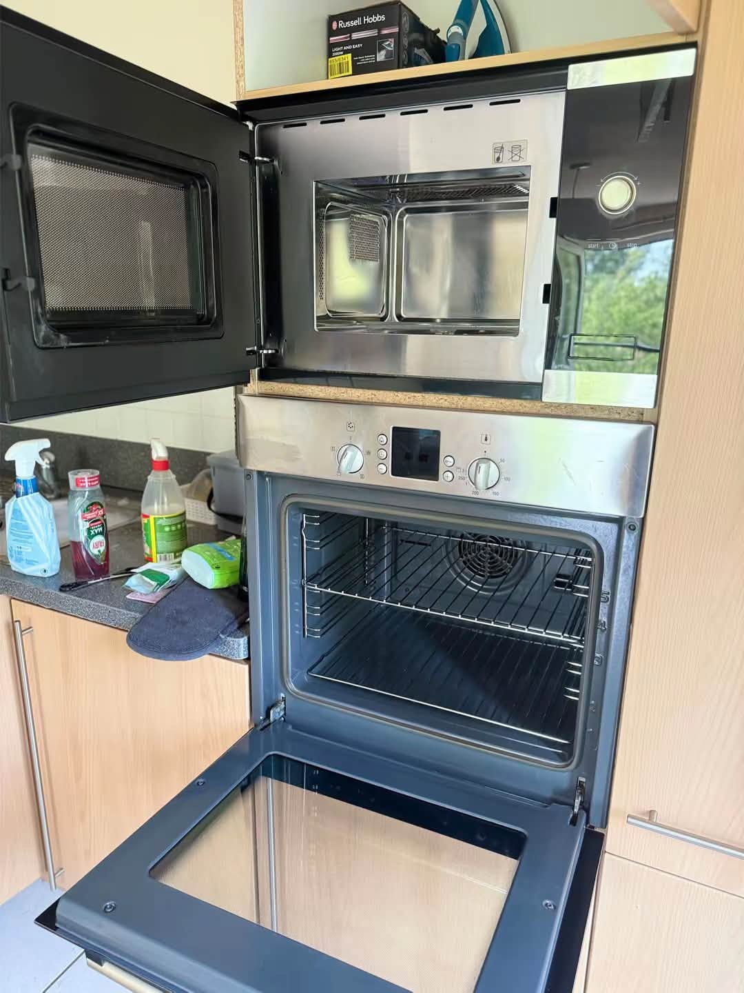Integrated oven and microwave cleaned inside and out